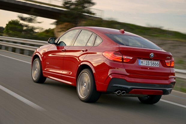 2015_bmw_x4_driving_rear