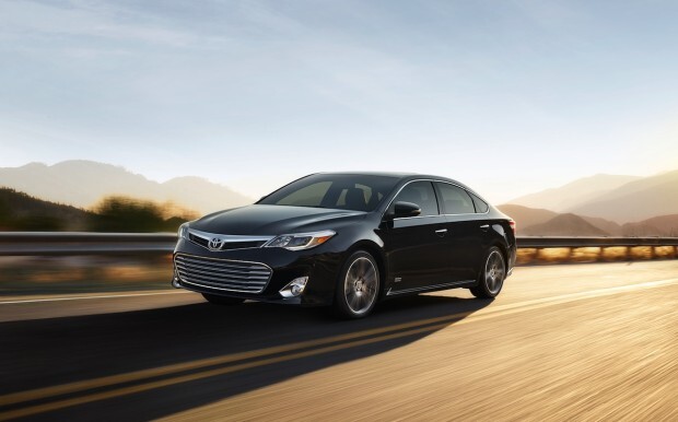 2015 toyota avalon touring sport driving on twisty highway