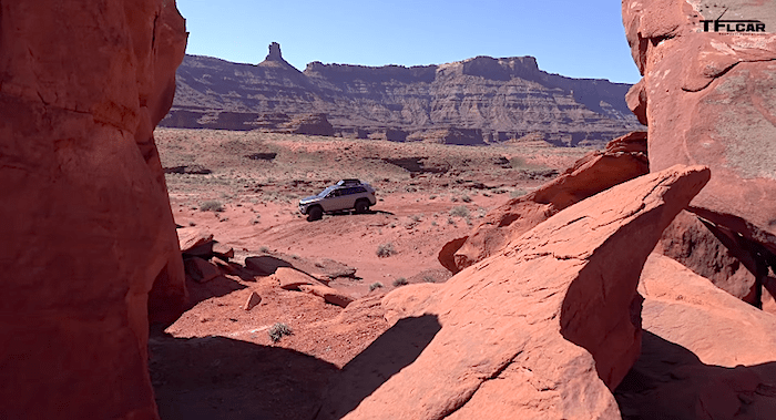 Easter Jeep Safari nature shot of a Jeep traveling through a stunning canyon