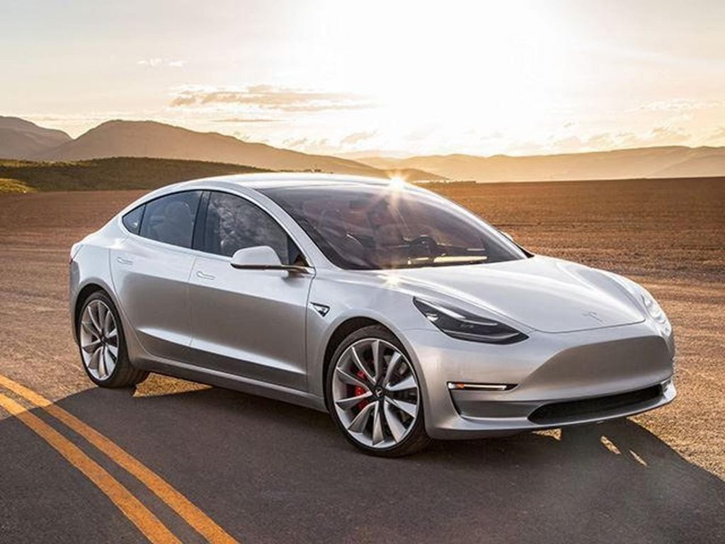 Investors Rally Behind Tesla, Even With $717.5 Million Quarterly Loss