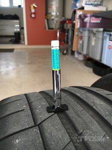 measuring tread depth - Continental ExtremeContact Sport long-term tire test